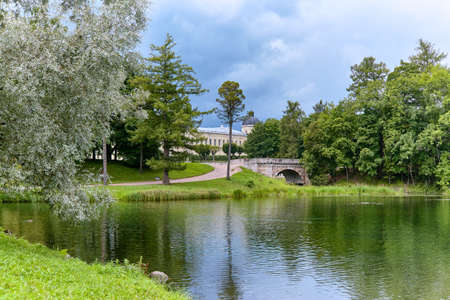 View of the Gatchina Palace from the side of the Palace Park, next to Karpin pond in autumn. St.Petersburgの写真素材