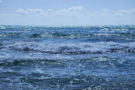 The Mediterranean Sea with raging waves on a summer sunny day. Valencia, Alicante, Spain.eanの写真素材