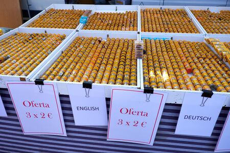 El Raso, Alicante, Spain - July 2, 2016: A variety of spices and spices in yellow glass bottles. Sunday market in Spain, Mercadillo de Campo de Guardamar.のeditorial素材