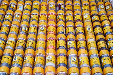 El Raso, Alicante, Spain - July 2, 2016: A variety of spices and spices in yellow glass bottles. Sunday market in Spain, Mercadillo de Campo de Guardamar.のeditorial素材