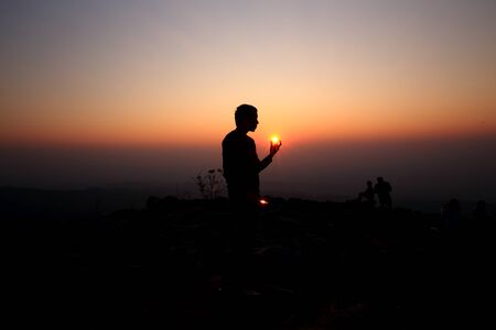 Man on top of mountainの写真素材