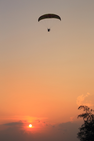 Paramotor and sunsetの写真素材