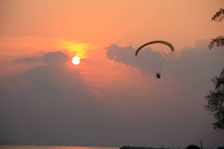 Paramotor and sunsetの写真素材