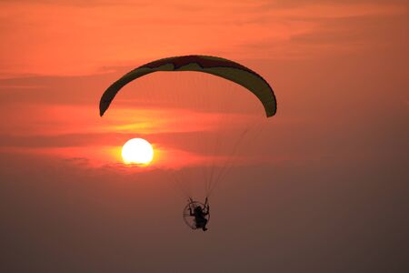 Paramotor and sunsetの写真素材