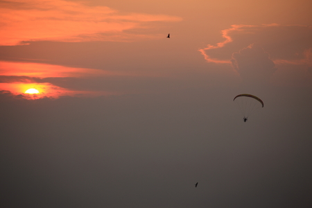 Paramotor and sunsetの写真素材