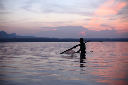 River and Silhouette Fishermanの写真素材