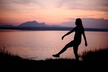 River and Silhouette Womanの写真素材