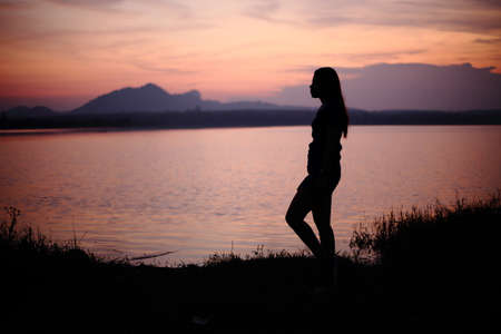 River and Silhouette Womanの写真素材