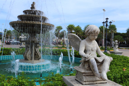 Children statue with wings in Verona Thailandの写真素材