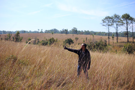 Man in Tung Salang Luang National Park Thailand.