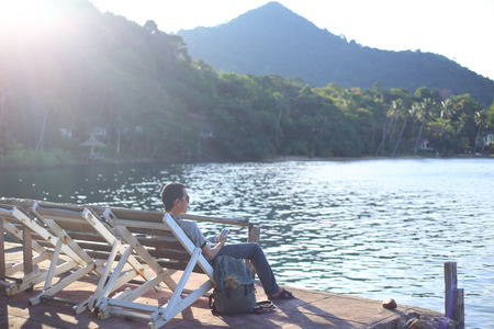 Man sitting on a beach chairの写真素材