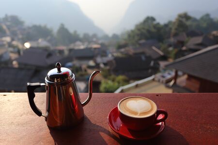 Kettle and hot coffee at Phahee, Thailandの写真素材