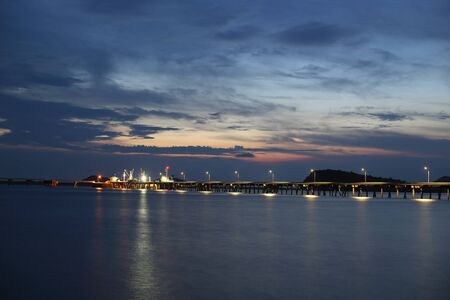 sea and pier in the evening at Sattahip ,Thailandの写真素材