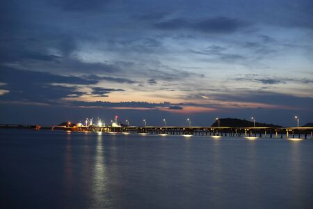 sea and pier in the evening at Sattahip ,Thailandの写真素材