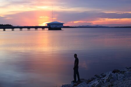 Dokkrai Reservoir and view sunset water reflection at rayong, thailandの写真素材