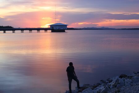Dokkrai Reservoir and view sunset water reflection at rayong, thailandの写真素材