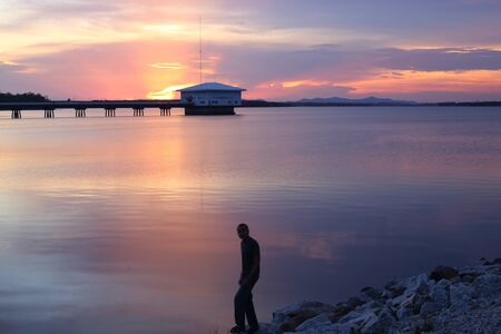 Dokkrai Reservoir and view sunset water reflection at rayong, thailandの写真素材
