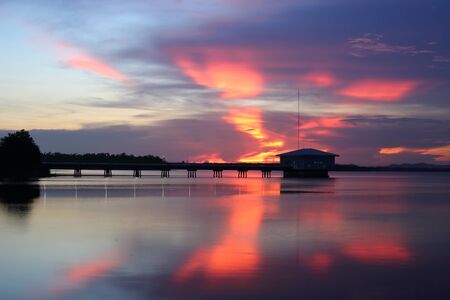 Dokkrai Reservoir and view sunset water reflection at rayong, thailandの写真素材