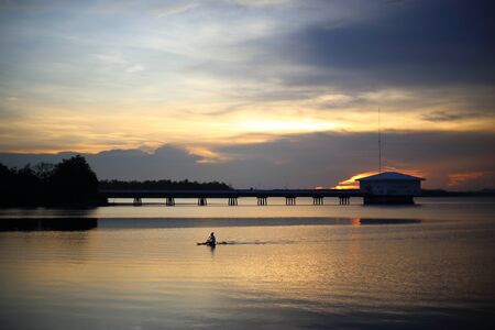 Dokkrai Reservoir and view sunset water reflection at rayong, thailandの写真素材