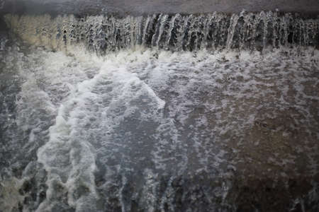 Close up of a waterfall on the river. Waterfall background.の写真素材