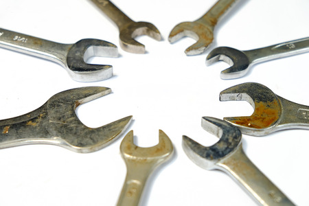 Hand Tools of different types lay around the white backgrondの写真素材