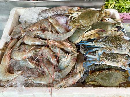 Fresh seafood placed in the basket such as fish, crab, shrimp.Food cart in Thailandの写真素材