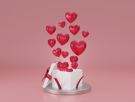 White gift box with red heart float on pinkの写真素材