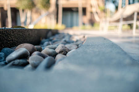 Stacking coins pile and white piggy bank for savings with money and planning step up to growing with business graph background, Saving money for retirement fund and the future plan concept.の写真素材