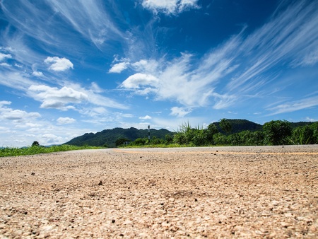 Asphalt road with blue skyの写真素材
