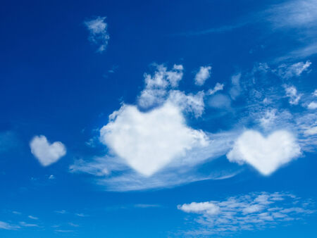 heart cloud shape blue skyの写真素材