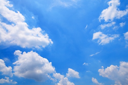 Blue sky with clouds backgroundの写真素材