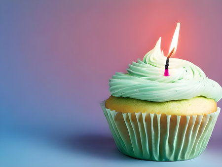 a cupcake with a lit candle on top of it. Generative AI.の素材