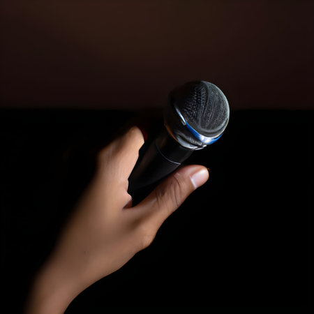 Person holding a microphone in hand on black background. Generative AIの素材