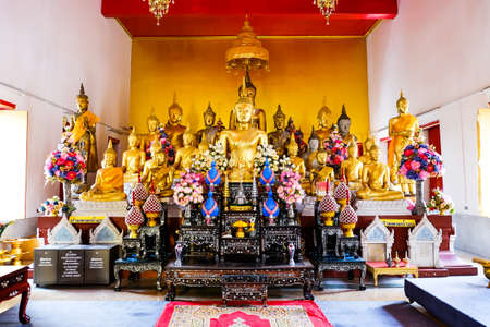 Gold buddha statue in the temple in Bangkok, Thailandの写真素材