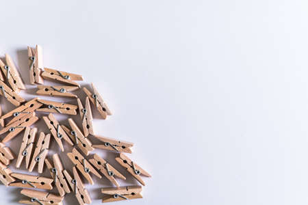 Wood clothespins isolated on white backgroundの写真素材