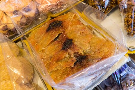 Dried squid in the market, close upの写真素材