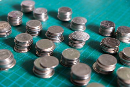 Thai Baht coins on green backgroundの写真素材