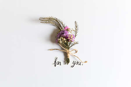 Bouquet of pink flowers on white backgroundの写真素材