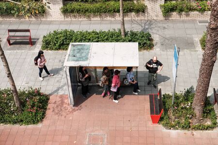 Taipei, Taiwan - March 30, 2017 : People waiting bus at the bus stop, top viewのeditorial素材