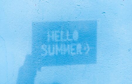 Shadow of text "Hello Summer" on blue background, summer timeの写真素材
