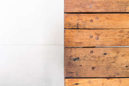 Half of wood and white cement background textureの写真素材