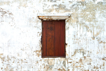 Wooden window on old white texture background