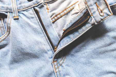Center detail of blue jeans in vintage style