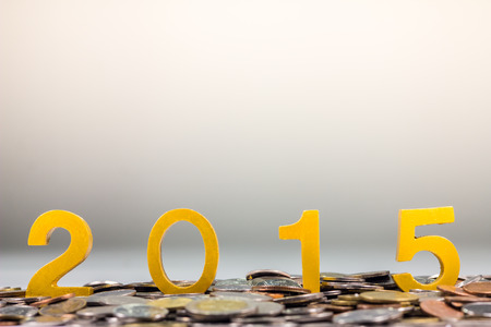 gold number year 2015 on thai baht coins stacksの写真素材