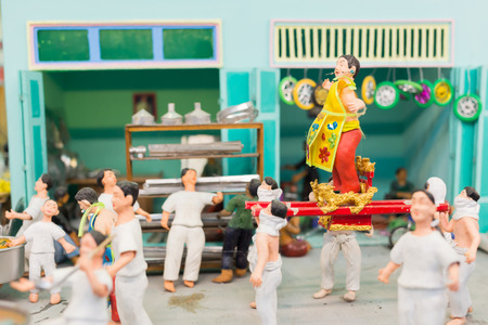 AYUTTHAYA THAILAND-NOV 16: Model display simulation spiritualist procession in Nine Emperor Gods Festival  on Norvember 16, 2014 at Taradnum- Tungbuvchom Ayuttaya Thailandのeditorial素材