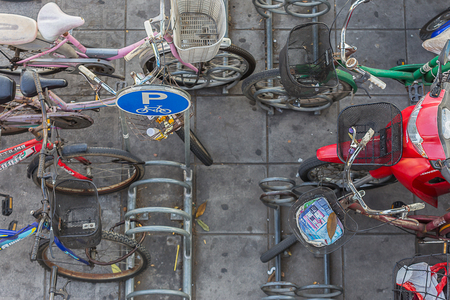 MINBURI, THAILAND FEBRUARY 06 : More People lock bicycle on rack. In Bicycle Parking  near Main Street  on February 06, 2015 in Minburi,Thailandのeditorial素材