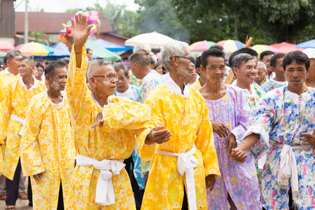 Thailand June 26: Men in flower cloak Folk Dance for ritual in Phitakhon festival on june 26 ,2015 in loei province of thailandのeditorial素材