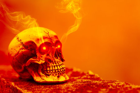 Abstract skull in orange tone with eye shining light and smoke. Concept   temperature world are hot...