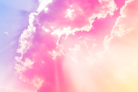 Clouds in the blue sky whit ray light pastel colors.の写真素材