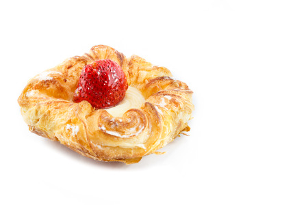 Denish pastry with fresh strawberry and crystal sugarの写真素材